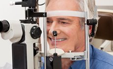 Man having eye check up